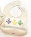 Maison Nola Fleur De Lis Silicone Bib - Cullen's Babyland & Playland